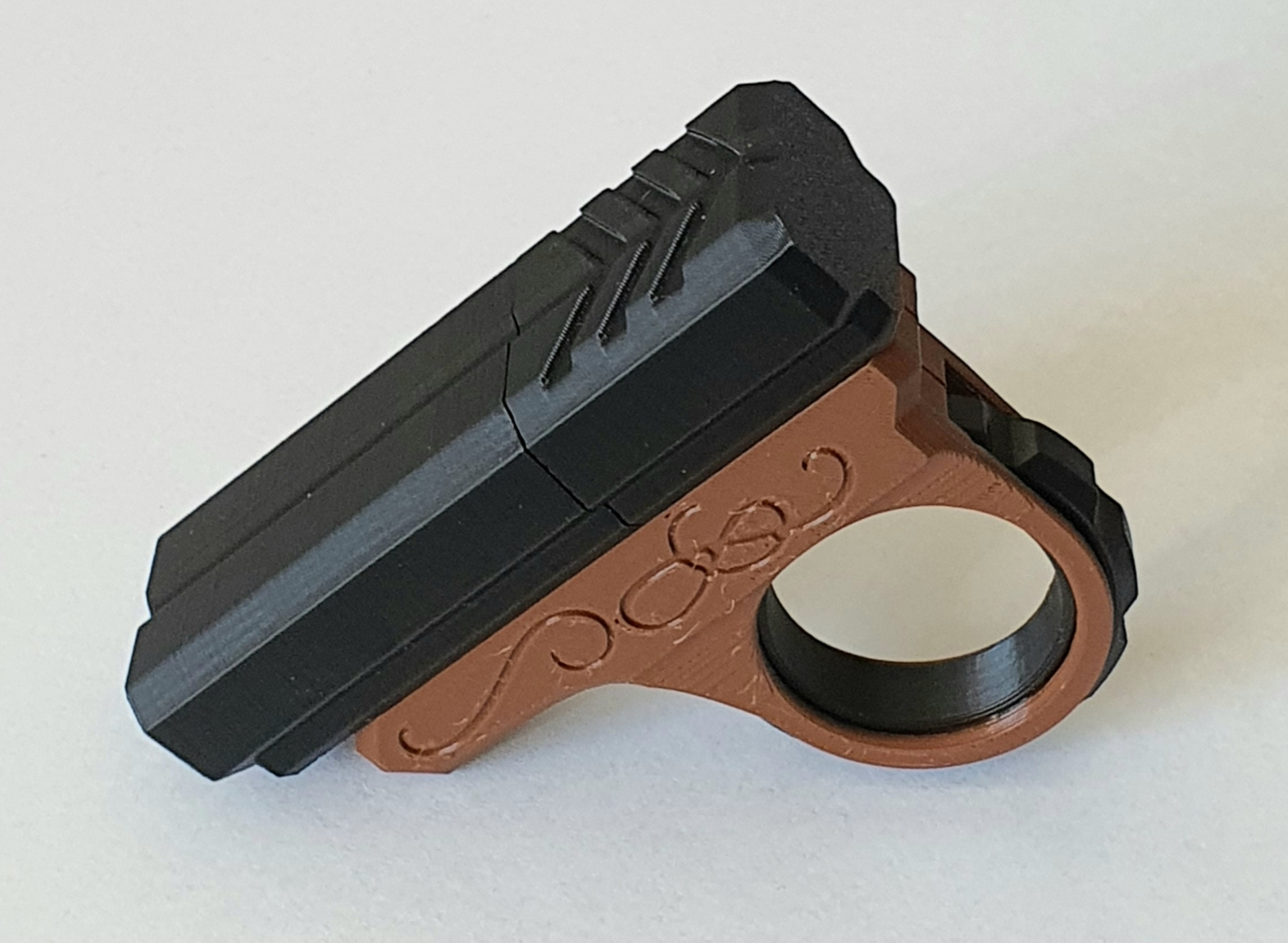 Pistolet Fidget Spinner Podwójna Lufa Antystresowa Zabawka + 2 Naboje