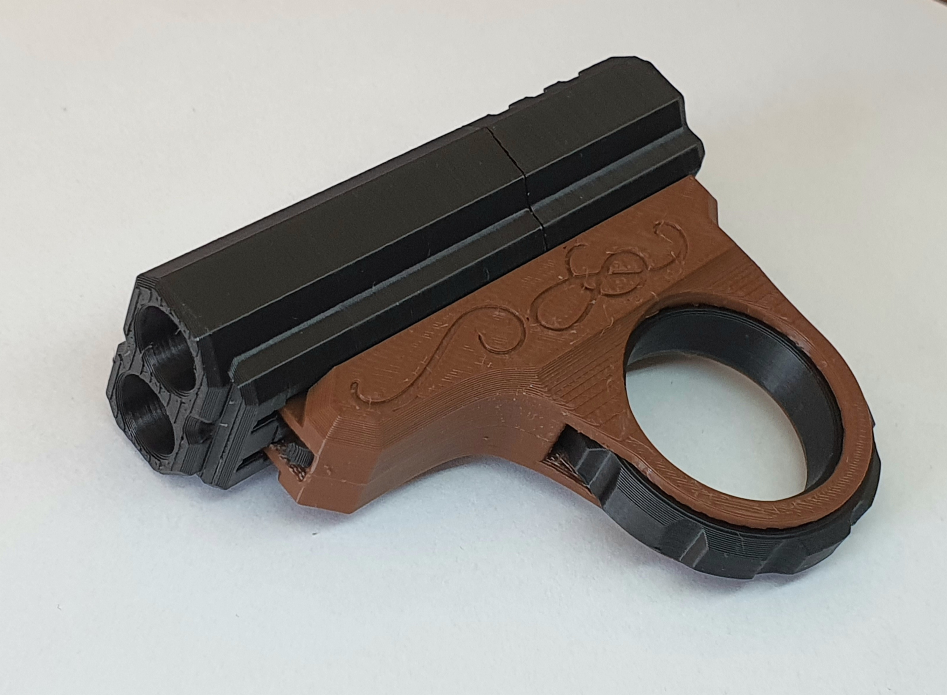 Pistolet Fidget Spinner Podwójna Lufa Antystresowa Zabawka + 2 Naboje