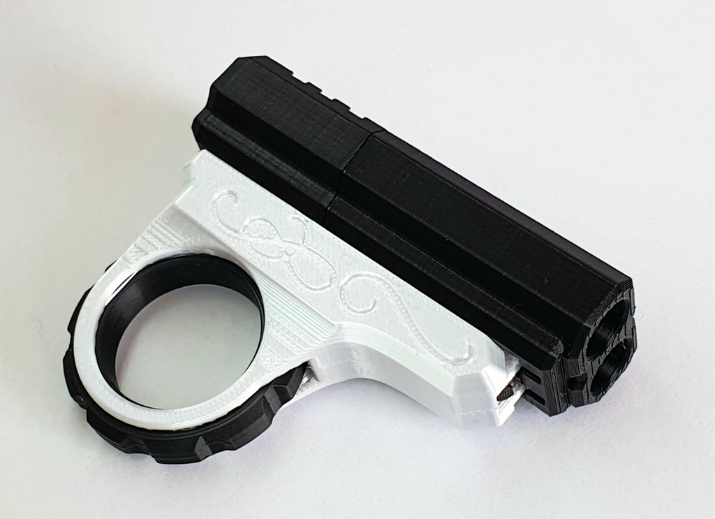 Pistolet Fidget Spinner Podwójna Lufa Antystresowa Zabawka + 2 Naboje