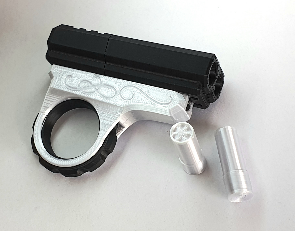 Pistolet Fidget Spinner Podwójna Lufa Antystresowa Zabawka + 2 Naboje