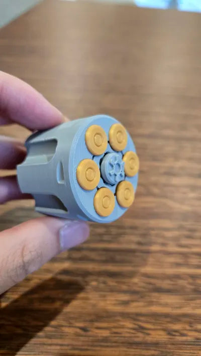 Bębenek Rewolweru Fidget - Realistyczny Gadżet EDC na Biurko Magazynek