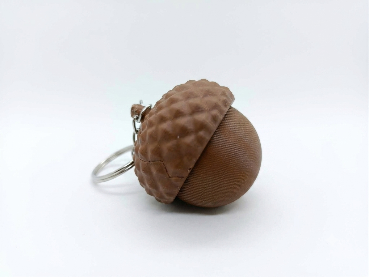 Tytuł oferty (74 znaki): Fidget Kliker Żołądź z Breloczkiem - Odstresowująca Zabawka w Kształcie Żołędzia