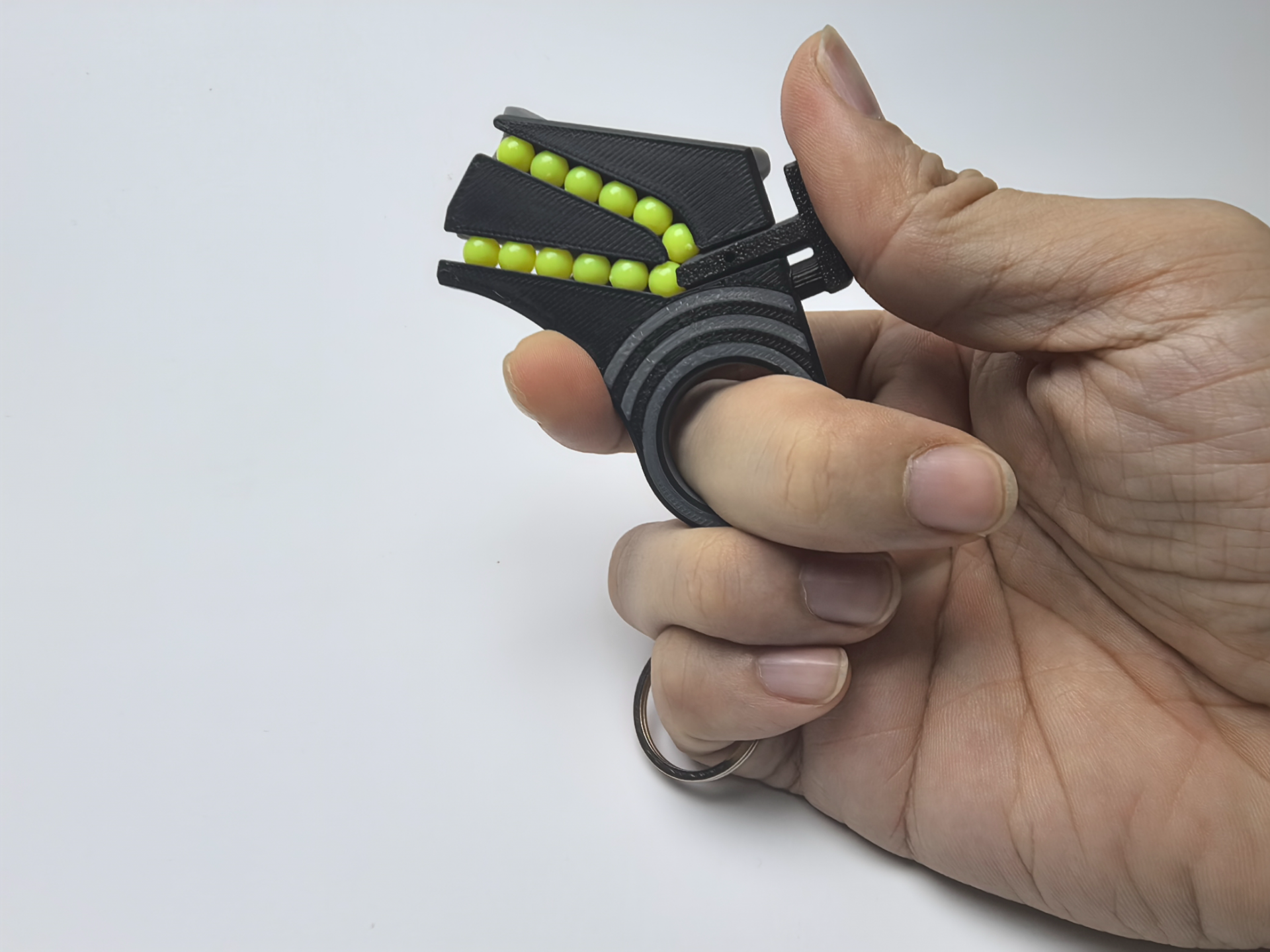 Mini Pistolet Fidget Magazynkowy – Brelok 3D na Kulki (BB)