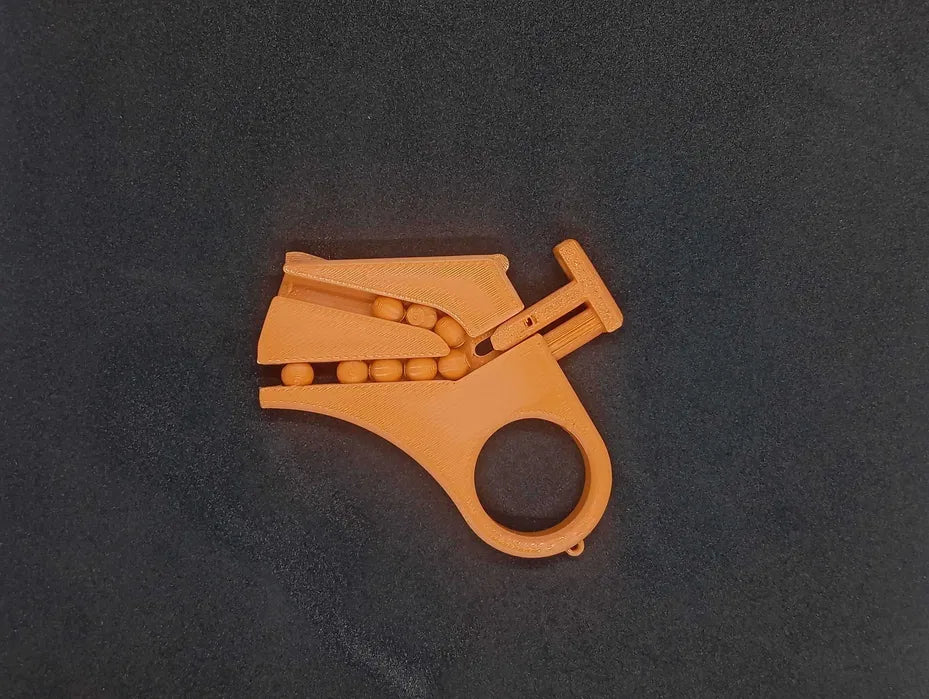 Mini Pistolet Fidget Magazynkowy – Brelok 3D na Kulki (BB)