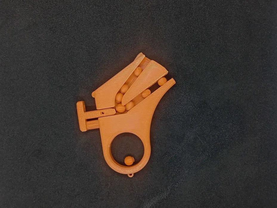Mini Pistolet Fidget Magazynkowy – Brelok 3D na Kulki (BB)