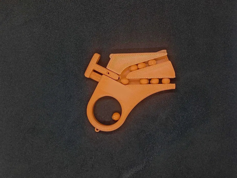 Mini Pistolet Fidget Magazynkowy – Brelok 3D na Kulki (BB)